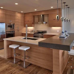 Photo of a kitchen with bar counters all made of wood