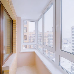 Design of windows on the balcony in the apartment photo