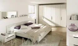 Bright bedroom with white furniture photo