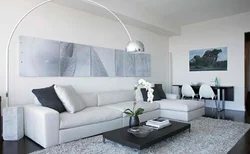 Black sofa in the living room interior photo