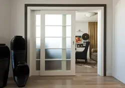 Sliding doors to the living room in the interior photo