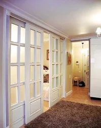 Sliding doors to the living room in the interior photo