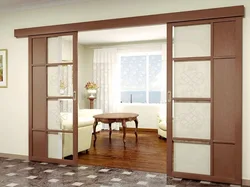 Sliding doors to the living room in the interior photo