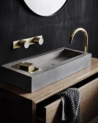Bathroom with black sink photo