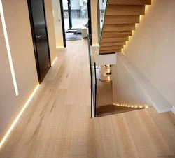 Design of laminate floors in the hallway photo