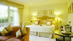 Yellow color in the bedroom interior