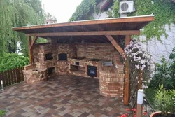 Kitchen in the country with barbecue photo