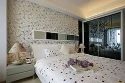 Wallpaper with a pattern in the bedroom interior photo