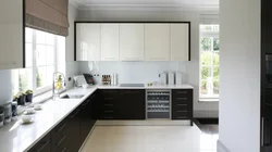 Design of a modern bright kitchen with a window