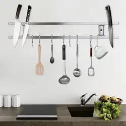 Kitchen railing with hooks photo
