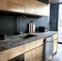 Gray kitchen with a wooden countertop and a wood-effect apron photo