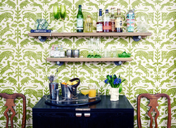 Shelves on the wall in the kitchen above the table photo