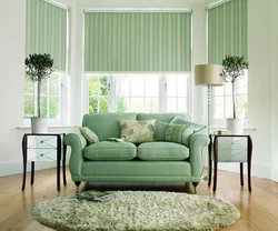 Green sofa in the kitchen interior