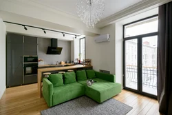 Green sofa in the kitchen interior