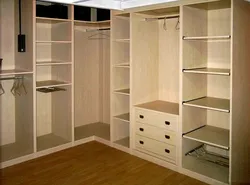 Corner built-in wardrobe in the bedroom inside photo