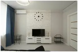 Qonaq otağının fotoşəkili üçün kərpic ilə divar kağızı