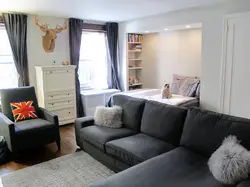 Bedroom design in an apartment with a sofa