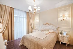 Beige curtains in the bedroom interior