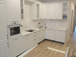 Kitchens with light countertops photo
