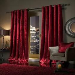 Velvet curtains in the bedroom interior