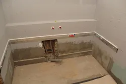 Tiles between bathroom and wall photo