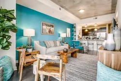 Turquoise in the interior of the kitchen living room
