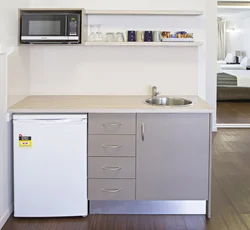 Kitchen interior with one small window