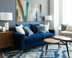 Bedroom with blue sofa design