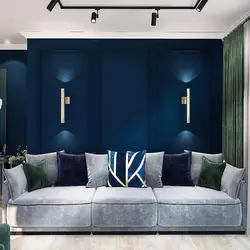 Bedroom with blue sofa design