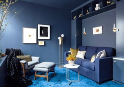 Bedroom with blue sofa design