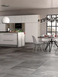 Gray tiles on the kitchen floor photo