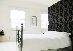 Interior in the bedroom if the wallpaper is black and white