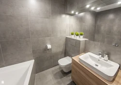 Gray Tiles In The Bathroom Photo In