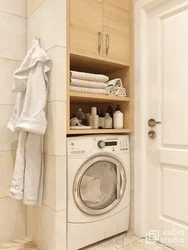 Built-In Washing Machine In The Bathroom In The Closet Photo