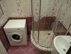 Photo Of A Small Bathroom With Shower And Washing Machine