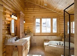 Interior Of A Bathroom In A Wooden House Made Of Logs