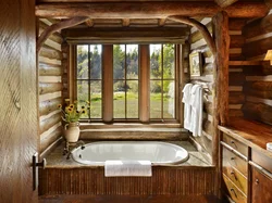 Interior of a bathroom in a wooden house made of logs