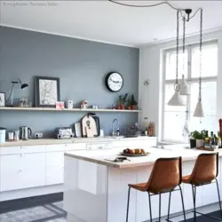 Kitchen with gray walls and white furniture photo