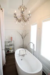 Chandelier in the bathroom design photo