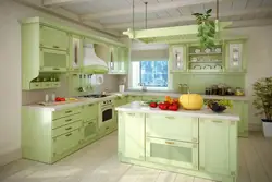 Püstə rəngli mebel ilə mətbəx interyeri