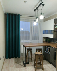 Turquoise color of curtains in the kitchen photo