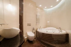 Bathroom design with a corner bathtub in light colors