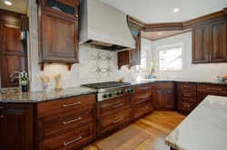 Kitchen design with wooden facades photo