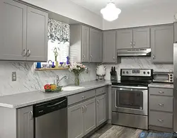 Photo Of A Gray Kitchen Combined With White