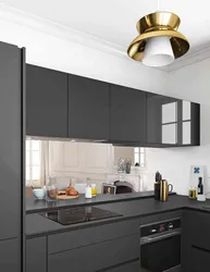 Photo of a gray kitchen combined with white