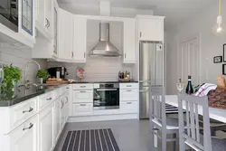 Photo Of A Gray Kitchen Combined With White