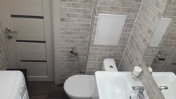 Combined bathroom in a panel house photo