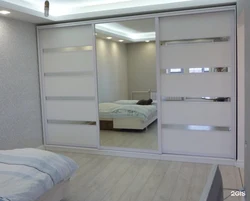 Full-wall bedroom furniture photo