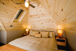 Bedroom design with lining on the ceiling