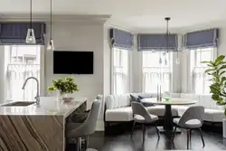 Design of a country house with kitchen, living room with bay window